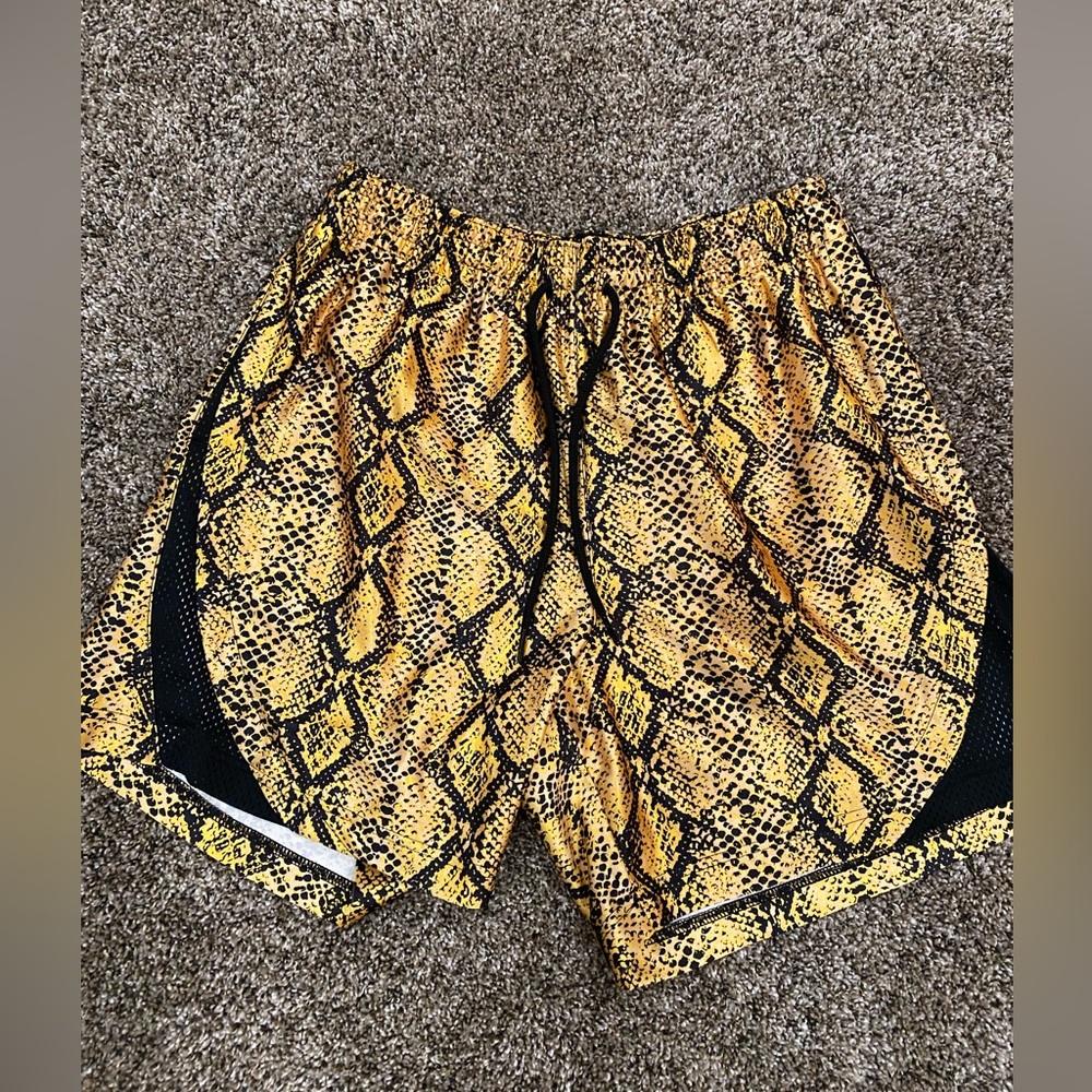 Nike Women’s Rebel fly snake print gym shorts medium